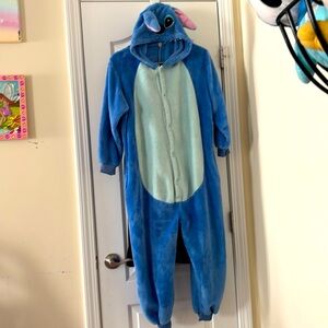 Stitch onesie with zipper at backside. Used but still has a lot of life left